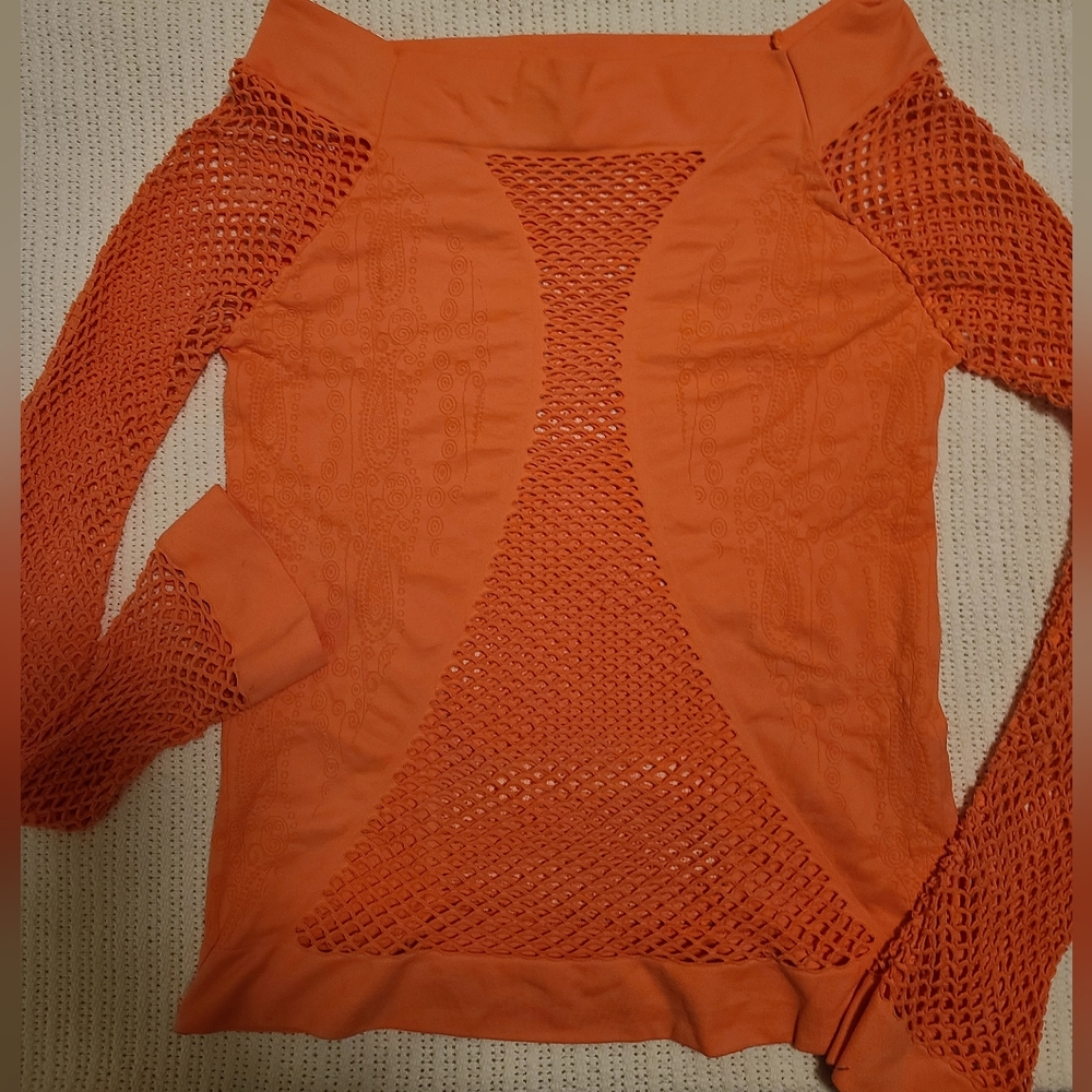 SUPER SEXY peach colored stretch shirt with mesh panels and sleeves